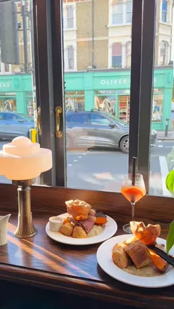 Delicious Sunday roast served at Bishop East Dulwich, inspired by @chynnas.bites' foodie recommendations.