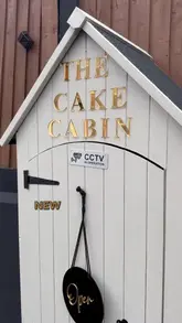 Delicious cakes displayed at The Cake Cabin, newly opened in Dudley, DY1 2QP. Perfect for dessert lovers!