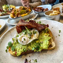 Brunch at @eat.kai in Leicester featuring delicious Biscoff pancakes for a perfect paternity leave treat!