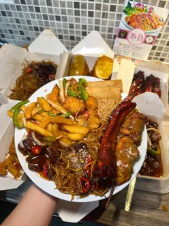 Delicious Chinese takeaway feast at Sky Dragon in Drumchapel with giant chicken curry ball, honey chilli beef, and more.