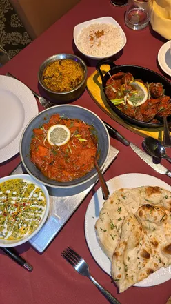 Delicious Indian dishes at Jalori in Woburn Sands, featuring tandoori lamb chops and chicken rogan.