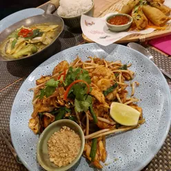 Delicious Pad Thai, green curry, and spring rolls at Giggling Squid in Leicester.