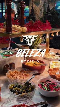 Guests enjoying delicious grilled meats and drinks at Beleza, the new Brazilian steakhouse in Solihull.