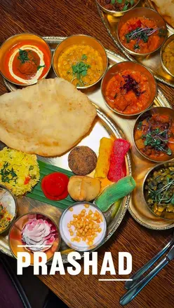 Michelin-star worthy Christmas Thali at Prashad in Bradford, combining festive English and authentic Indian flavors.