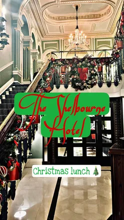 Elegant dining experience at The Shelbourne, featuring festive starters, mains, sides, and desserts in Dublin.
