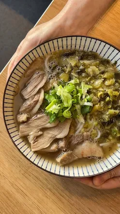 Hong Kong-style lamb rice noodle soup from Heart Noodles in Manchester, featuring tender lamb and house-made soup base.