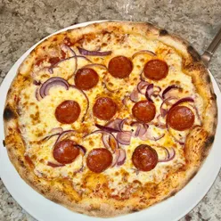 Delicious Mafia pizza topped with pepperoni and onion at Sergio's Italian restaurant in Chester.