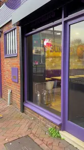 Exciting new items on the Bun Squad menu, featuring chicken wings and gourmet burgers at a Wycombe restaurant.