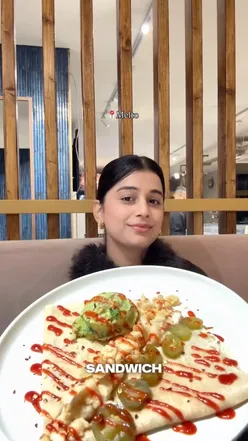 Delicious brunch at Melto café in Watford, featuring coffee, sandwiches, and indulgent desserts in a cozy ambience.