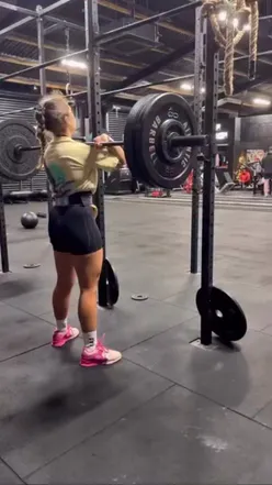 Mobile spray tan artist in Kilmarnock showcasing a bronzed beauty working out, highlighting health and fitness glow.