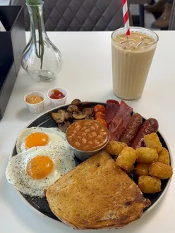 Delicious English breakfast with coffee at Brewch in Manchester, a top brunch spot for comfort and flavour.