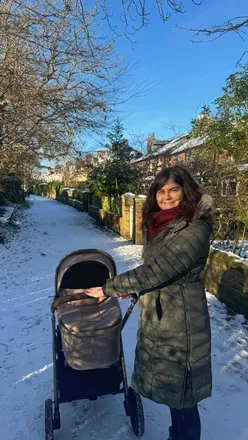 Family enjoying a cozy lunch at Dilan and The Bear in Whitley Bay on a snowy day, featuring steak and brunch options.