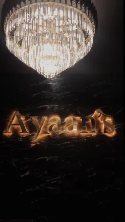 Delicious mixed starters featuring lamb chops, fish pakoras, and samosas at Ayaan's Restaurant in Bradford.