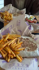 New Taco Bell menu items in Sheffield: Triple Layered Crunchwrap, Firecracker Chicken Slider, and Caramel Apple Empanada.