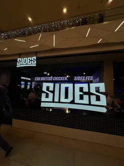 Delicious chicken dishes at Eatsides in Manchester, showcasing the Flavour Scale from sweet to spicy.