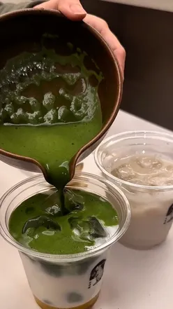 Guests enjoying matcha drinks at Tokkia in Covent Garden, a trending hotspot in London’s matcha scene.