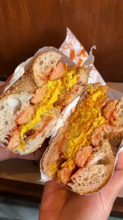 Vegan bagel options at Best Boy Bagels in Sheffield, featuring a cozy atmosphere and unique merchandise.