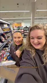 Women enjoying a fun shopping experience at Marks & Spencer Food Hall, sharing laughs on a mate date.