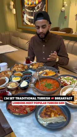 Traditional Turkish breakfast feast with dips, sucuk eggs, and fresh borek at Antepliler in Harringay, North London.