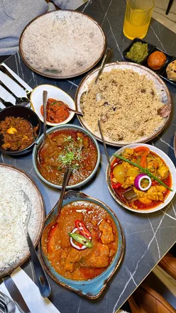 Batizas restaurant in Lozells, showcasing authentic Bangladeshi cuisine with friendly staff and a welcoming atmosphere.