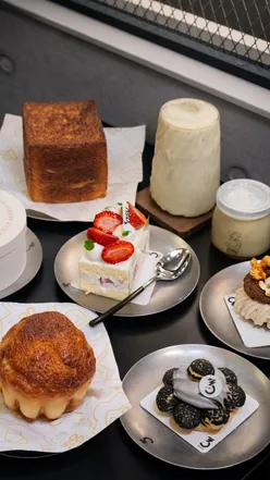 Ad Onsu Bakery, opening soon with Asian-inspired pastries and desserts by award-winning chef Michael Kwan. Affordable treats await!