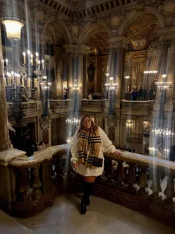 Traveler admiring Paris views, dreaming of luxury experiences and adventures in the City of Light.
