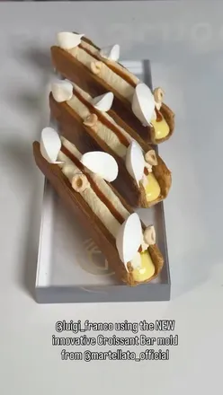 Chef Luigi Franco creating modern pastries at La Sfoglia Bar with innovative moulds from Martellato. #pastryinspiration