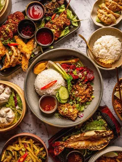 Vibrant dishes from Spice Thai on Bold Street, Liverpool, showcasing rich textures and bold flavors of Thai cuisine.