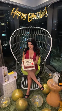 Birthday celebration in a luxury London penthouse, featuring spacious living and dining areas at NH Hotel.