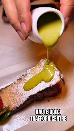 Brunch at Haute Dolci in Trafford Centre featuring vibrant breakfast dishes and desserts showcasing indulgent flavors.