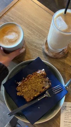 Cozy Dockside Coffee Bar in Royal William Yard serving coffee, pastries, and treats in a welcoming atmosphere.