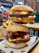Cheeseburger and Black Bear burger showcased at Black Bear Burger in London, featured in top burger guide.