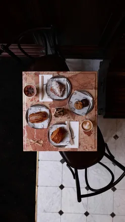 Visitors enjoying freshly baked pastries and coffee at the new Fred Bakery near Oxford Street, central London.