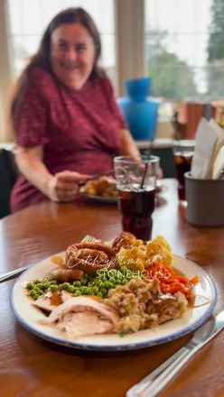 Cozy dining at The Plume of Feathers with a mother-daughter duo enjoying a carvery after a stylish remodel.