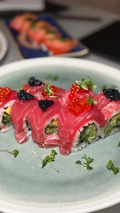 Private chef sushi experience at home featuring exquisite rolls and fresh ingredients by Vlad from @privatesushichef.london.