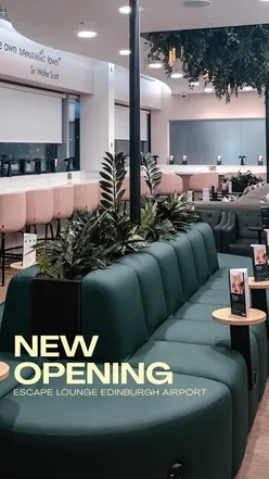Guests enjoying food and drinks at the new Escape Lounge in Edinburgh Airport, featuring modern decor and a buffet.