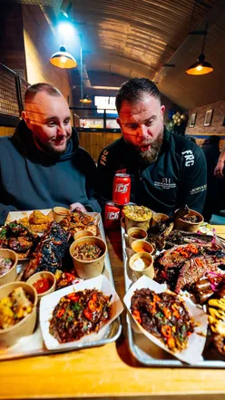 Food critic reviews Smokehouse restaurant in Birmingham, discussing BBQ dishes and the restaurant's upcoming closure.