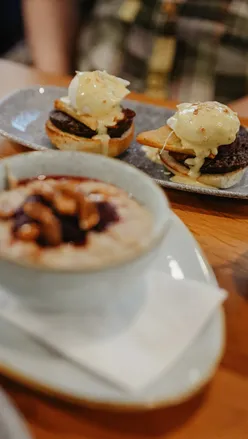 Brunch at Loudons in Edinburgh featuring porridge and a veggie power bowl, perfect for a cozy January morning.