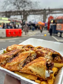 Shawarma with garlic sauce, fries, and salad at Sunday quayside market, plus coffee and sausage for dogs.
