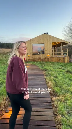 Cozy cabin getaway in Ireland, perfect for a January retreat, featuring a beautiful view and serene atmosphere.