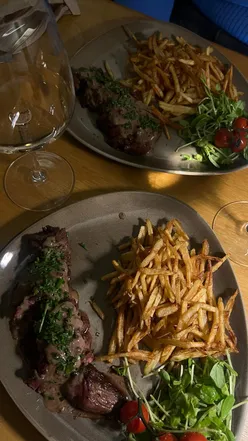 Delicious steak frites at Le Haricot, a French bistro in Sheffield, capturing authentic Parisian dining vibes.