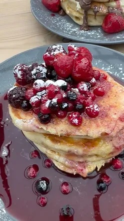 Indulgent pancake stacks with strawberries and Nutella, enjoyed with flat white and chai latte at Y Shed, Gowerton.