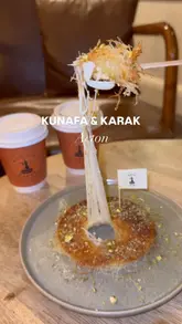 A short, music-led montage showcasing a dessert and tea shop, featuring close-ups of kunafa with a cheese pull, brownies, strawberry cups, and karak tea.