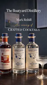 Captain Ciaran's bottled Wet Martini, Dry Martini & Negroni cocktails with Mark Reihill artwork at a Boatyard Distillery event.