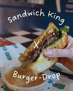[ad-gifted] @itssandwichking x @burgerdropuk 🥪

I popped to Burger-Drop on Saturday to try their limited edition King's Sandwich and it was something totally different to your usual burger/sandwich!

The combination of the garlic toasted bloomer, beef pattys, crunchy potato sticks, cheesy goodness, dunked in peppercorn gravy was just something else ✨ So many layers of flavour and textures, I haven't enjoyed a sandwich like that in AGES.

The service is super speedy, it's not too expensive either and there is so much to choose from. I got some salt and pepper loaded fries too😋

What's in the sarnie👇
Toasted garlic bloomer
Chimichurri mayo
2 X smashed prime Angus beef pattys
Salted potato sticks 
Rocket
Swiss cheese
Grated parmesan 
Peppercorn gravy to dunk 

It's only available in March, so be quick!!

Thanks again for inviting me along ✌️

#sandwichking #burgerdrop #foodie #teessidefoodie #middlesbroughfood