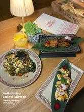 Indian feast at India Bistro, Chapel Allerton: Palak patta chaat, tandoori chicken, and truffle cheese kulcha.