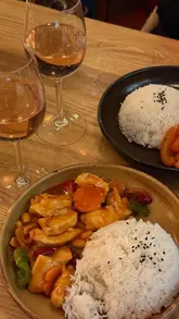 A review of a pub called Tap & Tuk Tuk in Harrogate that serves Asian fusion food. The video features the creator trying various starters and mains, including crispy pork belly, satay chicken, wasabi prawns, kung po chicken, and sweet and sour king prawns, followed by a chocolate brownie dessert.