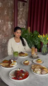 Layla's new waterside brunch spot in Castlefield, Manchester, showing pancakes, water views, and a stylish interior.