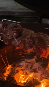 A first-person POV cooking video demonstrating the preparation and rotisserie cooking of a dry-aged Picanha steak from a local butcher.