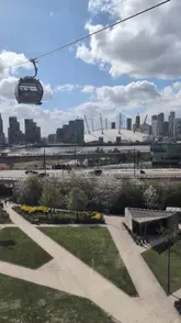 A short montage showcasing the IFS Cloud Cable Car in London, featuring aerial views of the River Thames and the O2 Arena.